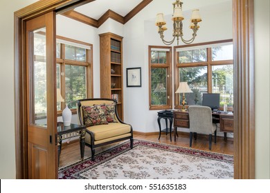 Traditional Home Office With Wooden Sliding Door. 