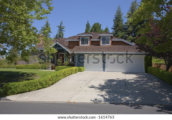Traditional Home Two Dormers Three Car Stock Photo Edit Now 1614763