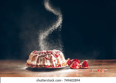 Traditional Homemade Christmas Cake With Pomegranate Powdering With Icing Sugar 