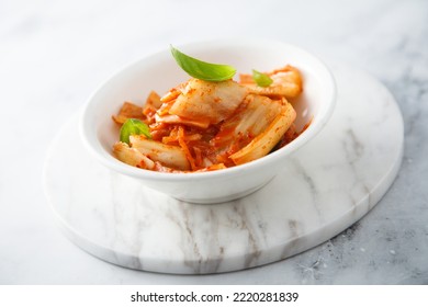 Traditional Homemade Kimchi Cabbage In A White Bowl