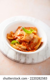 Traditional Homemade Kimchi Cabbage In A White Bowl