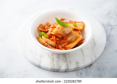 Traditional Homemade Kimchi Cabbage In A White Bowl