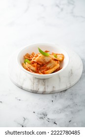 Traditional Homemade Kimchi Cabbage In A White Bowl