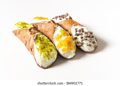 Traditional homemade Sicilian sweet called cannoli stuffed with cream cheese