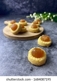 Traditional  Homemade Snack During Hari Raya Called Kuih Tart Or Tart Cookies Over Dark Background