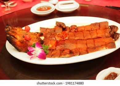 Traditional Hong Kong Style Bbq Roasted Suckling Pig Typically Served At A Chinese Wedding Or Special Occasion.