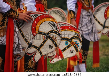 Traditional horse dance from java, the horse toy is made of woven bamboo, and it is called kuda lumping.