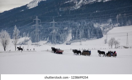 A Traditional Horse Drawn Sleigh Ride Through The White Winter Landscape