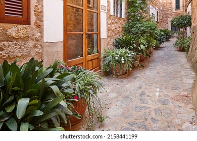 Traditional House Facade Decorated With Plants In Mallorca, Balearic Islands