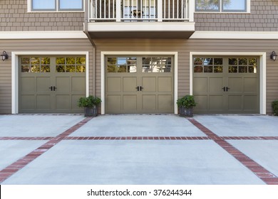 Traditional House With Three Single Car Garage 