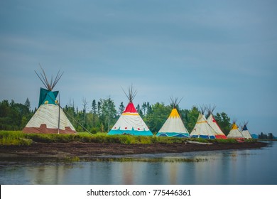 Traditional Houses Of Native Americans Installation In Gesgapegiag City, Quebec, Canada.