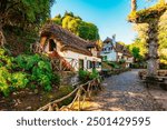 Traditional houses in Queimadas Forest Park near Santana, Madeira. Hiking point to PR9 Levada do Caldeirao Verde