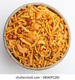 Traditional indian deep fried salty dish - chivda or mixture or farsan or farsaan made of gram flour and mixed with dry fruits ,Indian traditional Namkeen - Shutterstock ID 1804091281