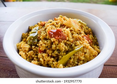 Traditional Indian fasting food recipe dish called Bhagar homemade of Barnyad millet rice grains. Also known as samo or sama pulao rice khichdi. Closeup of maharastrian gujarati vrat upawas food - Shutterstock ID 1932957770
