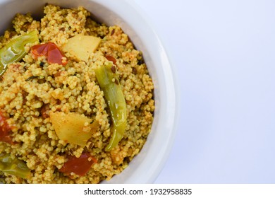 Traditional Indian fasting food recipe dish called Bhagar homemade of Barnyad millet rice grains. Also known as samo or sama pulao rice khichdi. Closeup of maharastrian gujarati vrat upawas food - Shutterstock ID 1932958835
