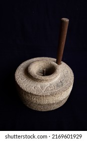 Traditional Indian Flour Mill On Black Background Used Manually To Grind Flour From Grains