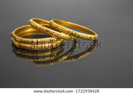 traditional indian gold bangles, also known as 