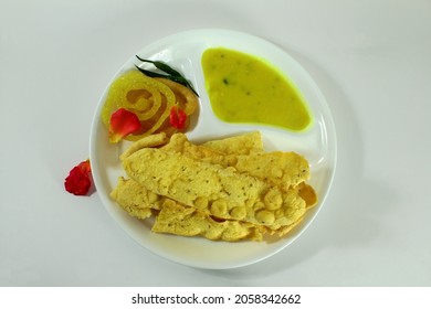 Traditional Indian Gujarati Snack Fafda With Sweet Jalebi And Chutney For Indian Holiday In White Background