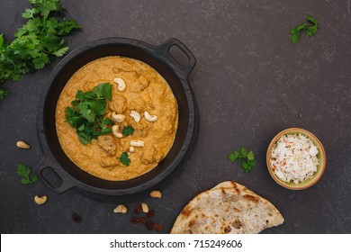 Traditional Indian Lamb Curry  With Rice And Peshwari Naan.  Top View, Blank Space