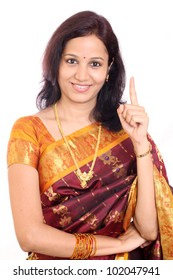 Traditional Indian Woman Holding Her Index Finger Up