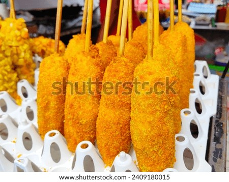 Traditional Indonesian food, known as Corndog. Very delicious to eat during the day.