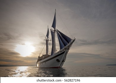 Traditional Indonesian Phinisi Schooner. The pinisi or phinisi is a traditional Indonesian two-masted sailing ship. These boats are made to ply the waters of the Indonesian archipelago. 