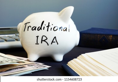 Traditional Ira Handwritten On A Side Of Piggy Bank.