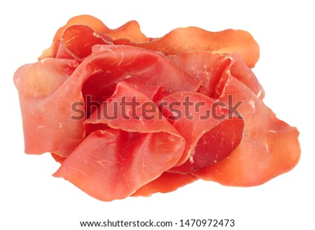 Traditional Italian Bresaola dry cured beef slices isolated on a white background