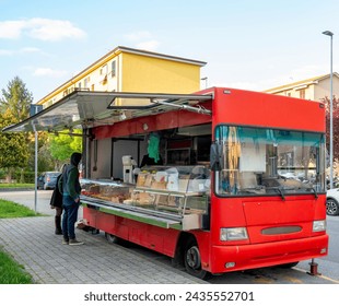 The traditional Italian cuisine on the road. Food served by small trucks around the streets. - Powered by Shutterstock