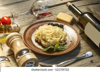 Traditional Italian Dinner. Pasta, Fettuccine, Wine.