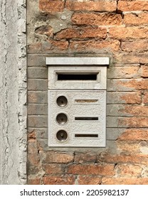 Traditional Italian doorbell and post box on a wall of a rustic building. - Shutterstock ID 2205982137