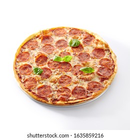 Traditional Italian Pepperoni Pizza With Salami, Chili Pepper, Mozzarella Cheese, Fresh Basil, Tomatoes And Tomato Sauce Isolated. Delicious Italy Salami Flatbread Cutout, Tasty Fast Food Closeup