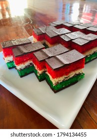 Traditional Italian Rainbow Cookies Or Seven Layer Bars 
Three Layers Of Almond Sponge Cake, Two Layers Or Raspberry Jam, Two Layers Of Dark Chocolate  