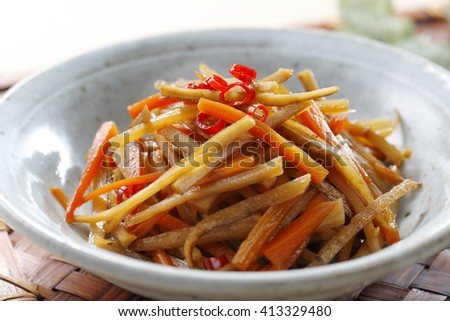 It's a traditional Japanese dish made with burdock root  It has a sweet soy flavor.