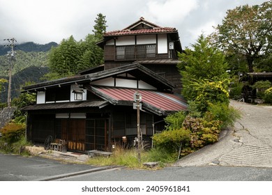 Traditional japanese houses on the Nakasendo trail between Tsumago and Magome in Kiso Valley, Japan. - Powered by Shutterstock