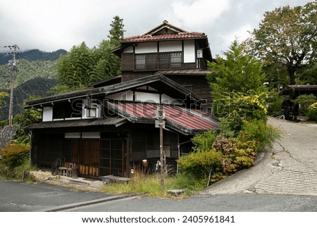 Traditional japanese houses on the Nakasendo trail between Tsumago and Magome in Kiso Valley, Japan.