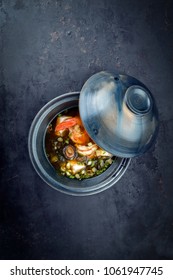 Traditional Japanese Miso Soup With King Prawns And Tofu As Top View In A Bowl With Copy Space 