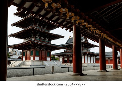 Traditional Japanese temple with a pagoda and Japanese lanterns - Powered by Shutterstock