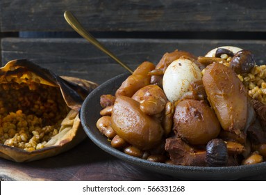 Traditional Jewish Cholent (Hamin) prepared is Israel as the main dish for the Shabbat meal made with beef, potato, beans, barley, and more and served with horseradish sauce (Chrein)
