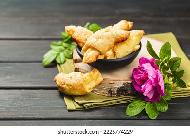 Traditional Jewish Rugelach Or Kifli Crescent Rolled Cookies With Rose Jam Filling. Freshly Home Baked Shortcrust Pastry Croissants Confection