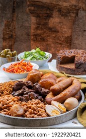 Traditional Jewish Shabbat  Meal (Cholent Hamin) Slow Cooked Beef, Potato, Beans, Brown Eggs, Wheat, Chick Pea And Onion, Served With Salads, Pickles And Jewish Dish (kugel) Made Of Pasta