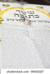 Traditional jewish wedding, signing prenuptial agreement  ketubah. Jewish marriage contract.