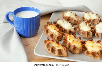 Traditional karelian pasties with cup of milk