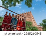 Traditional King and queen, called Raja Rani, handmade puppets or Katputli Sets are hanging for sale inside Meharangarh fort, Jodhpur, Rajasthan, India. Dolls in Jodhpur popular and sold to tourists.