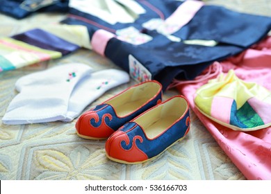 Traditional Korean children's shoes on the first birthday party. - Powered by Shutterstock