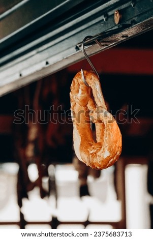 Traditional Kringle hanging at a butcher's shop in Bolzano