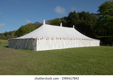 Traditional Large White Pole Marquee In The Grounds At Hartland Abbey In Rural Devon, England, UK