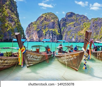 Traditional longtail boats in the famous Maya bay of Phi-phi Leh island, Thailand