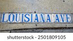 Traditional Louisiana Avenue tile inlay (street sign - not a trademark nor artwork) on sidewalk in Uptown Neighborhood in New Orleans, Louisiana, USA