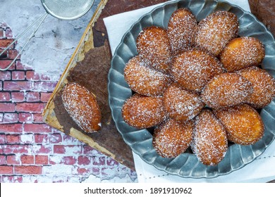 Traditional Madeleines Cakes Dusted With Icing Sugar - Overhead View